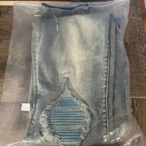 Women's Distressed Blue Jeans